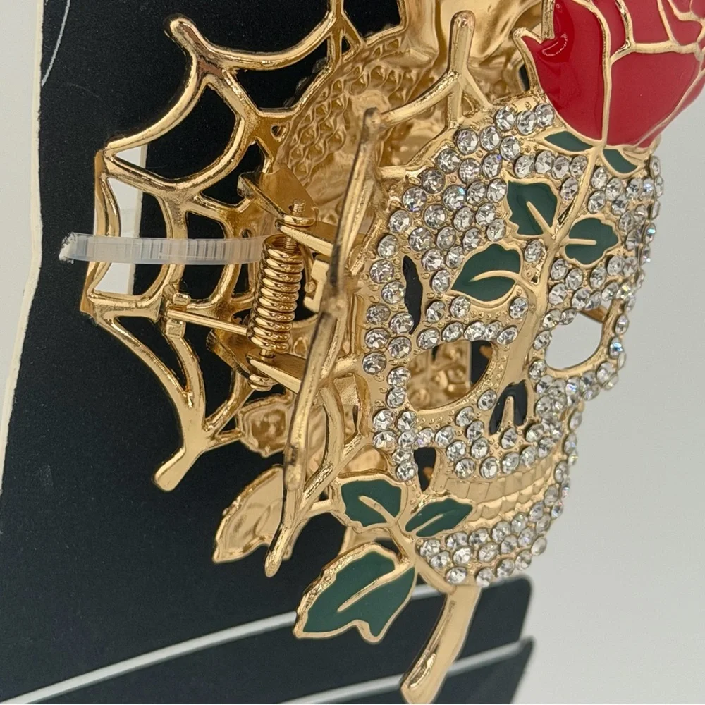 Nicole Miller Gold-Tone Crystal Skull Hair Claw Clip with Red Rose and Web